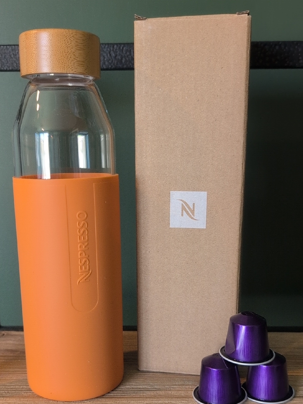 Nespresso Orange-Sleeved Glass Bottle with Bamboo Lid